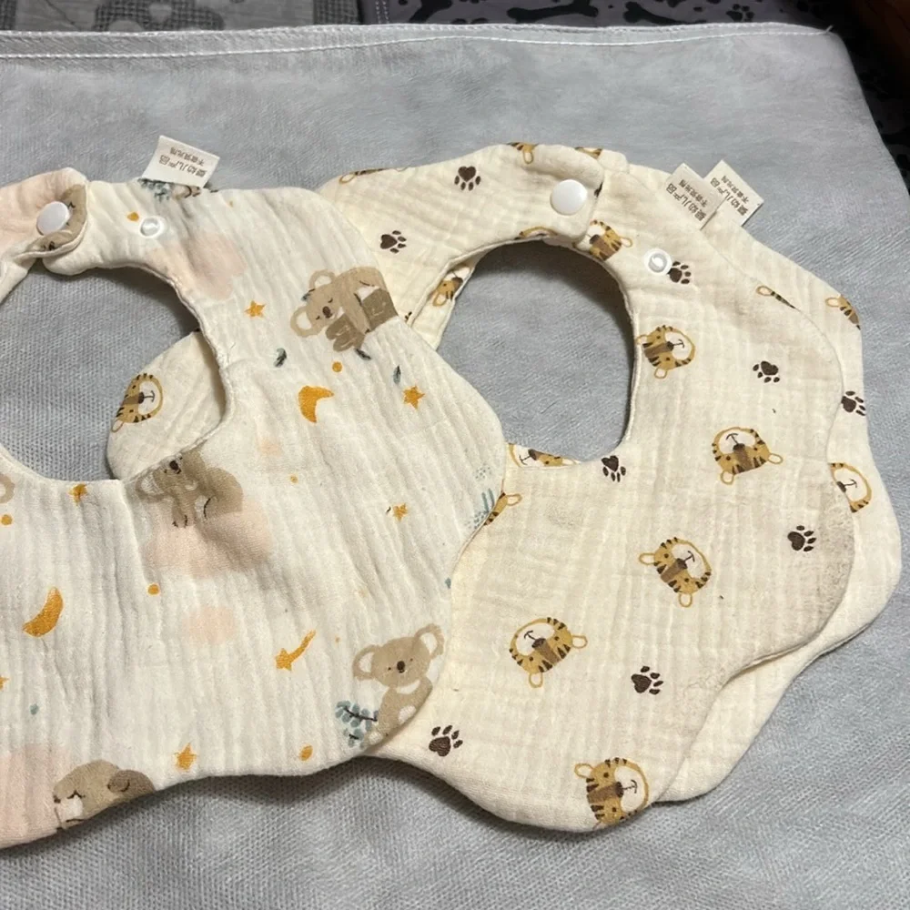 six Muslin bibs